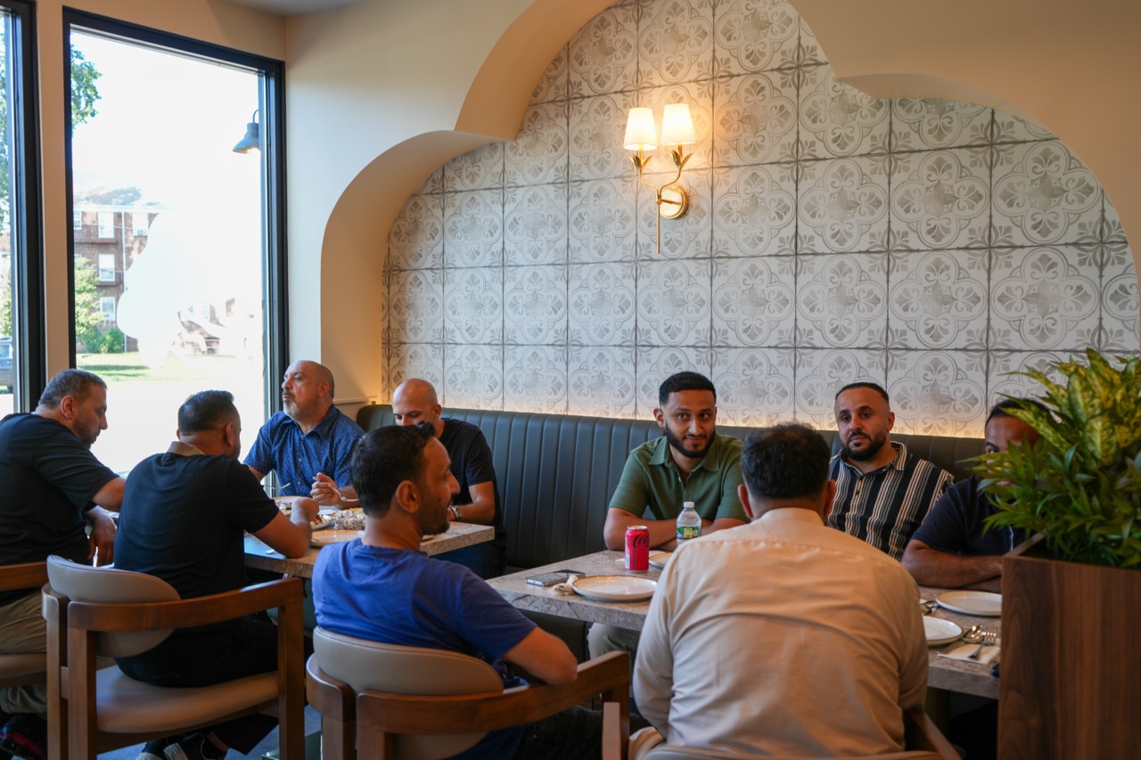 Guests sharing dishes at SOCOTRA